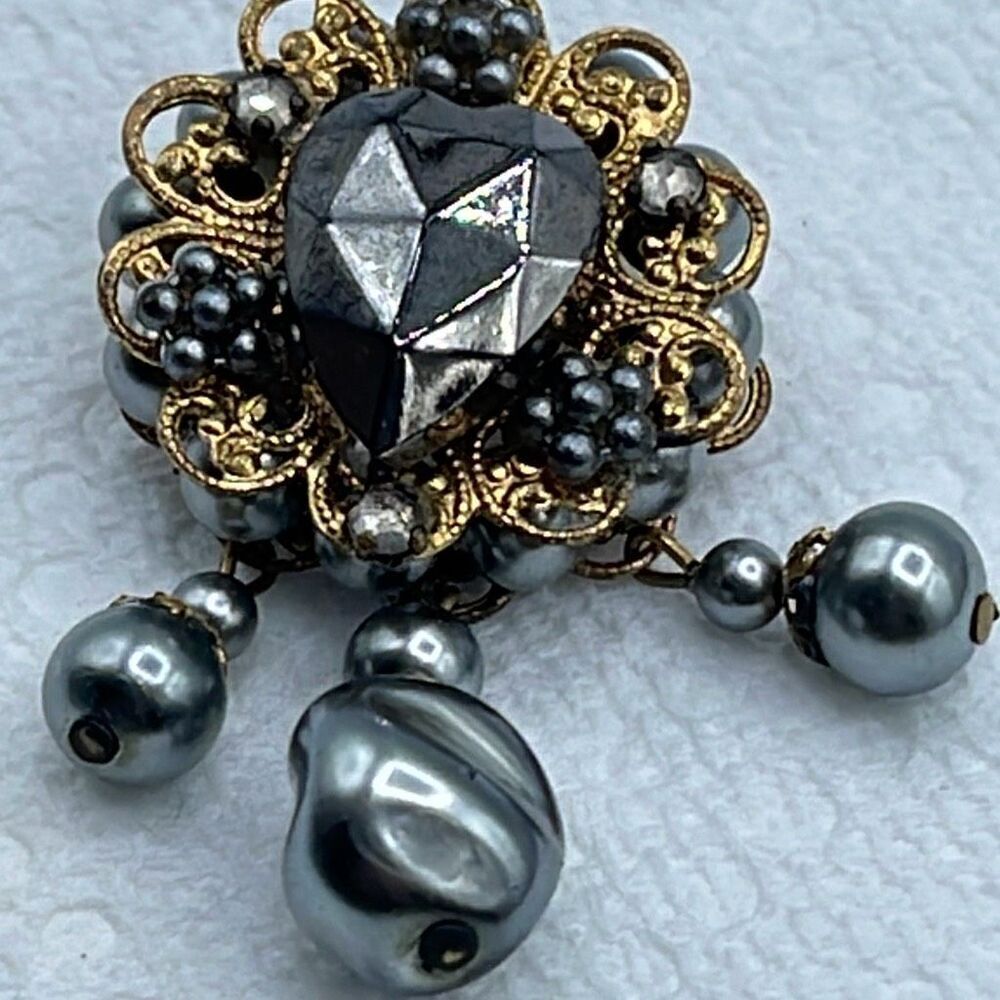 Vintage layered dangle brooch.